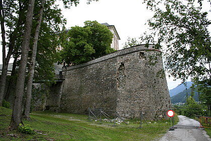  Castle wall with many broken stones and broken spots.