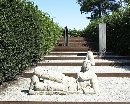 The stone sculpture "Large dormant" at the foot of the stairway to heaven in the Pheasant Garden. 
