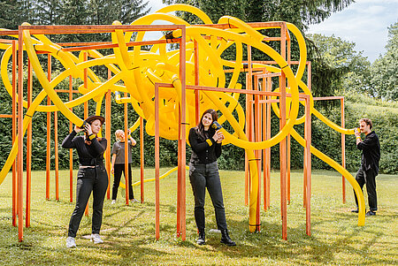 The existing metal artwork will be adapted with yellow hoses and a sound installation. 